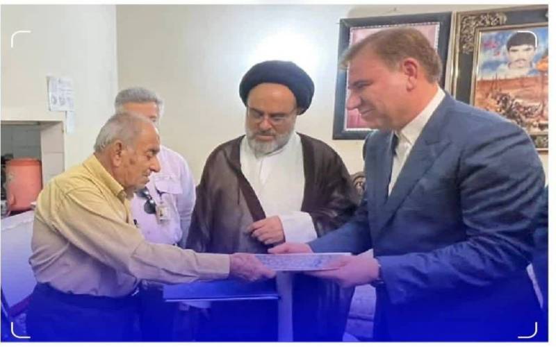 دیدار استاندار بوشهر با خانواده شهید کارمند حسن پیمان در شهرستان جم
